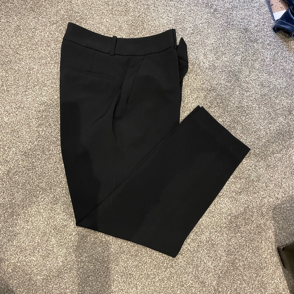 Black dress pants. Tapered leg. Never worn.